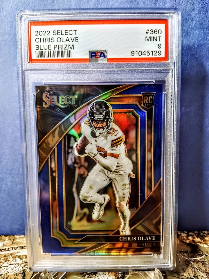 2022 Panini Select Chris Olave Suite Level Blue #14/99 Rookie PSA 9 - Image 1 of 2