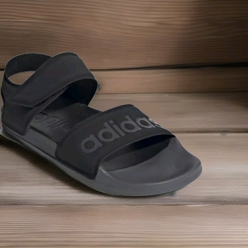 Adidas Adilette sandali imbottiti per uomo e donna in nero (5 uomini 6 donne).