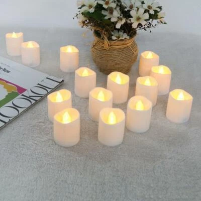 12pcs Irregular LED Flickering Tea Light Warm White Flame less Fake Candle Decor - Image 1 of 4