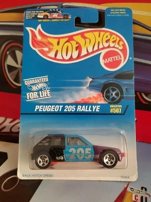 Tarjeta azul Hot Wheels #507 Peugeot 205 Rallye en negro/azul/púrpura - base naranja Foto 1 de 4