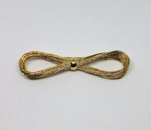 Broche prendedor vintage con lazo de cinta grande tono dorado - Imagen 1 de 4