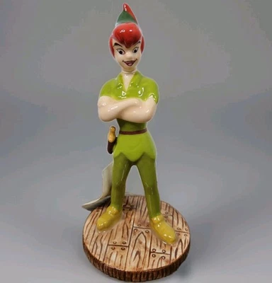 Figura De Colección Disney Peter Pan Porcelana 5" Figura De Pie Peter Brazos Cruzados Foto 1 de 4