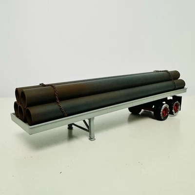 Corgi 1:50 Heavy Haulage Flatbed Trailer Model With Plastic Pipe Load - Image 1 of 4