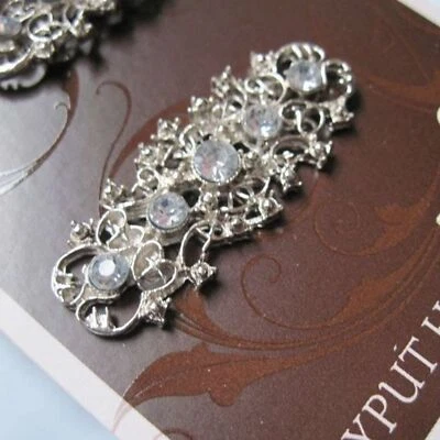 2 pasadores de pelo de metal a prueba de deslizamiento Goody Luxe Stay Put clips traseros seguros plateados Foto 1 de 4