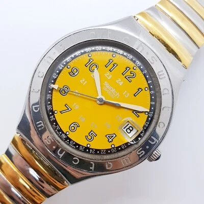 1997 年黄色瑞士制造斯沃琪讽刺不锈钢手表 90 年代 — 第 1/4 张图片