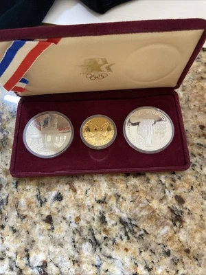 1983 - 1984 U.S. Olympics Gold & Silver Proof Commemorative 3 Coin Set Box - Image 1 of 4
