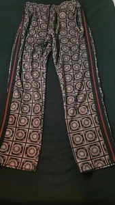Pantaloni Urban Outfitters Track Oscar a righe stampa floreale taglia small vestibilità unisex - Foto 1 di 9
