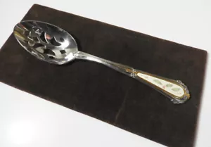 Cuchara para servir perforada de acero inoxidable 8 5/8" con inserto de cerámica - Imagen 1 de 1