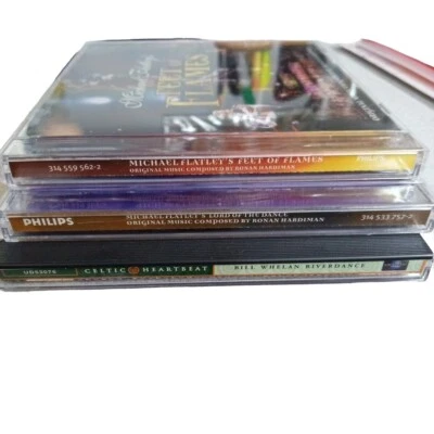 Michael Flatley’s Lord Of The Dance Feet Of Flames & Bill Whelan Riverdance CDs Foto 1 de 4