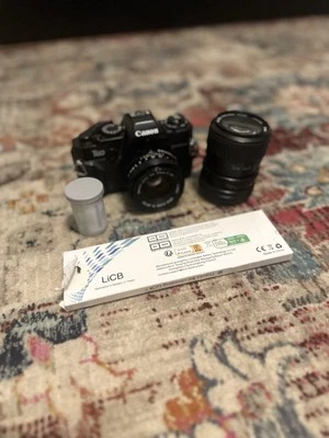 Canon T60 35 mm PROBADO con 2 lentes, película y baterías Foto 1 de 4