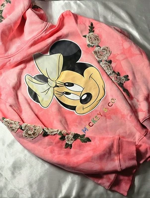 Régimen Civil Disney Mickey & Friends Minnie Mouse Pequeña Acogedora Sudadera con Capucha Rosa Mármol Foto 1 de 4