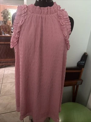 Vestido rosa sin mangas con volantes Foto 1 de 4