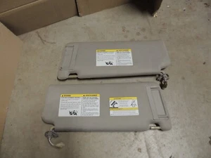 2004-2010 Infiniti QX56 Titan Armada SUN VISOR SET PAIR DRIVER PASSENGER - Picture 1 of 7