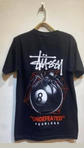 Stüssy "UNDEFEATED" Black '8' T-Shirt |Brand New| S–5XL | Streetwear (BK3164-BK) - Picture 1 of 3