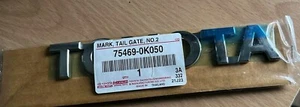 BRAND NEW IN PACKET GENUINE TOYOTA HI-LUX TAILGATE NAME EMBLEM P.N. 75469-0K050 - Picture 1 of 1
