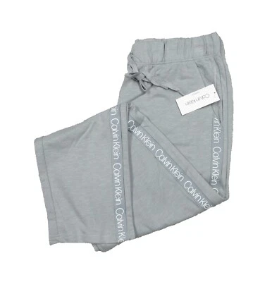 Pantalones de salón Calvin Klein para hombre gris con logotipo de cinta lateral Foto 1 de 4