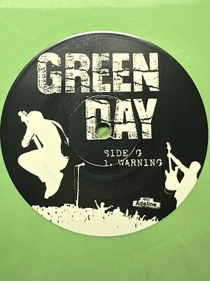 GREEN DAY - WARNING 2014 US LTD ED OF 500 GREEN MARBLE 7” VINYL NM PLAY/WAX 3TRX - Image 1 of 4