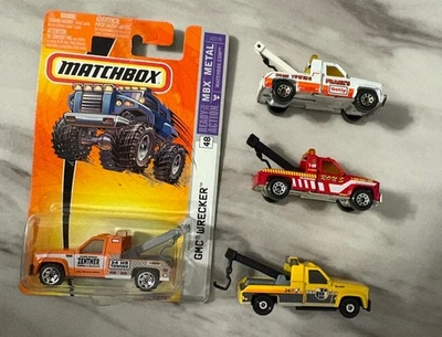 Matchbox Gmc Wrecker tow truck lot of 4 1 carded 3 loose variety colors - Image 1 of 4