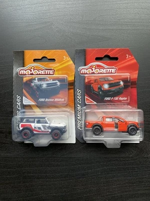 Majorette Ford F-150 Raptor And Bronco Wild track - Mint On Card - Sold As Seen - Image 1 of 4