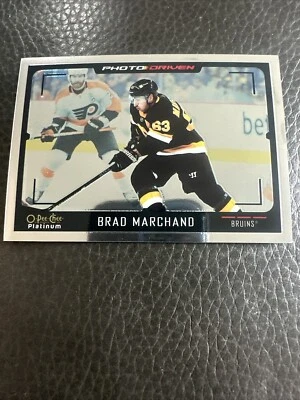 2021-22 O-Pee-Chee Platinum NHL Brad Marchand Photo Driven Insert Card #PD-4 OPC - Image 1 of 2