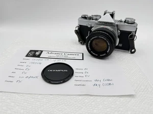 Lente Olympus OM-1 CON 50 mm f1,8 probada con película sellos nuevos excelente estado. Ver notas 0478 - Imagen 1 de 13