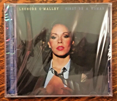 *32Bit* LEONORE O'MALLEY~FIRST BE A WOMAN~2010 CD~NEW~CLASSICS DJ CLUB