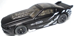 2012 HOT WHEELS '13 FORD MUSTANG GT GRFX BLACK 1:64 DIECAST 3 1/8" CAR W/ WHITE - Picture 1 of 6