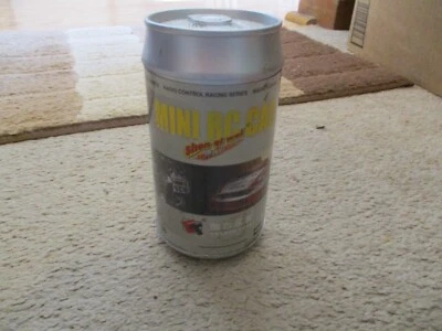 MINI RC CAR CAN BLACK WITH ORANGE STRIPE SATURN - Image 1 of 3