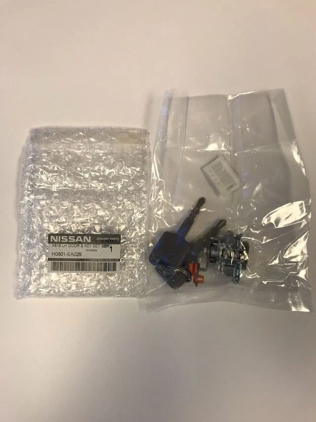 Cilindro de bloqueo de puerta delantera izquierda genuino Nissan con llaves - NUEVO OEM Foto 1 de 4