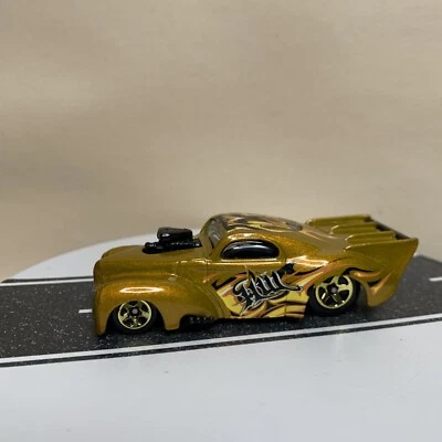 Hot Wheels #61 All Stars 21/36 '41 2008 Willys Gold MTFLK Variation con 5 velocidades  Foto 1 de 4