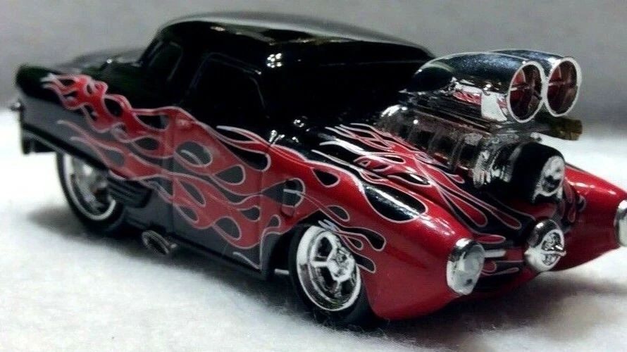 The Original Muscle Machines 1950 Studebaker Coupe 50 Studebaker Flames  1/64  - - Image 1 of 4