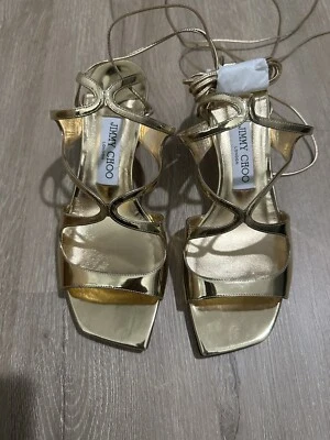 NUEVO SIN CAJA SANDALIAS JIMMY CHOO AZUL 50 MM OUI ORO METÁLICO GATITO TACONES US7 37 Foto 1 de 4