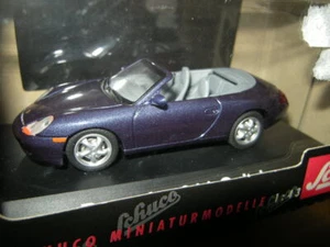 1:43 Schuco Porsche tipo 996 serie 1 convertible púrpura/púrpura en embalaje original - Imagen 1 de 1