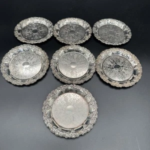 7 Vintage Etched Silver Plate Coasters Set of Embossed Grape Vine Raised Edge - Picture 1 of 11