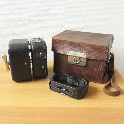 CÁMARA DE CINE PATHE-BABY 9,5 MM de colección con MOTOR CAMUFLAJE SUIZO y FUNDA DE CUERO Foto 1 de 4