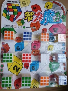 12x Unisex Mini Puzzle 3x3x3 Cubes Multi Coloured Pinata Prize Gift Toys - Picture 1 of 4