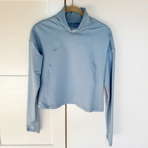 Athleta Whistler Mock Neck Cropped Top Damen XS Blau Langarm Athleisure Gym - Bild 1 von 4