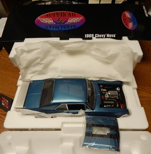 MODELLO IN SCALA ESATTA 1969 CHEVY NOVA SUPERCAR IN BLU SCALA 1/18 1 DI 420 NUOVO CON SCATOLA - Foto 1 di 3