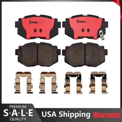 Juego de pastillas de freno traseras ranuradas de cerámica Brembo OE con clips para Subaru Scion Toyota Foto 1 de 2