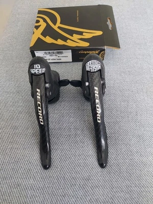 Campagnolo 10 Speed Carbon Ergo Shifters. Excellent Condition. New Hoods. - Image 1 of 4