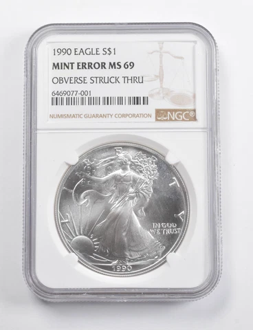 Mint Error MS69 1990 American Silver Eagle OBV Struck Thru NGC *3458 Cover