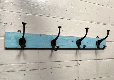 Vintage Wall Mounted Blue/Black Metal Coat Hooks x 4 on Wooden Painted Board - Image 1 of 4