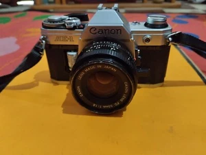 Appareil photo Canon AE-1  a réparer ou pour pièces - Photo 1 sur 9