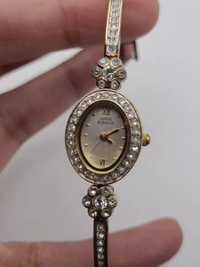Anne Klein II Lady Analog Quarz Damenuhr goldfarben Bling Lünette funktioniert - Bild 1 von 12