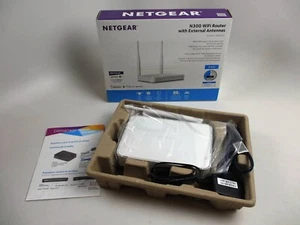 NETGEAR N300 WiFi Router With External Antennas (Model No. WNR2020-200PAS) - Picture 1 of 4