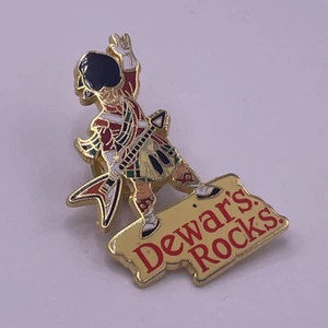 VTG Dewars Rocks Guitar Playing Scotsman Scotch Whiskey Hat Backpack Lapel Pin - Picture 1 of 3