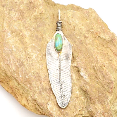 Colgante de pluma de piedras preciosas turquesa de plata de ley 980 Foto 1 de 3