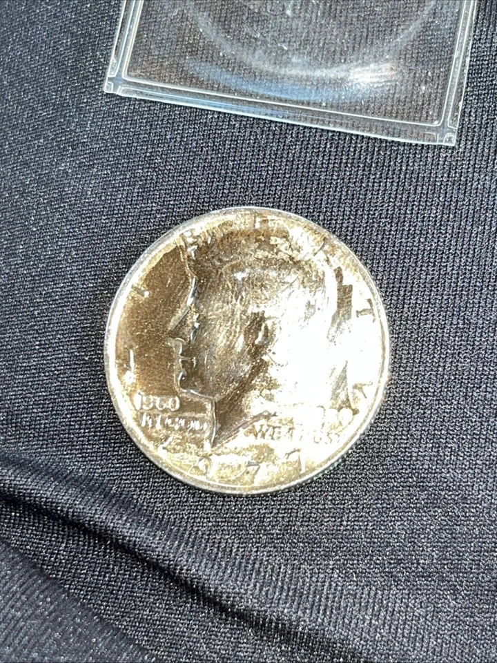 Very rare 1977 Kennedy half dollar also stamped 1960 and 1980 on sides - Image 1 of 3