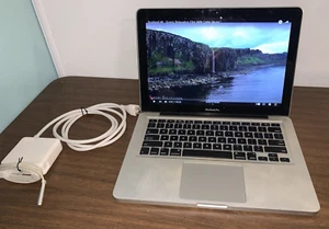 Apple MacBook Pro 13" Mid-2010 Core 2 Duo 2.4 - 4GB 250GB A1286 Powers on Read - Photo 1/12