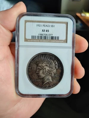 Dólar de plata P Peace 1921 - Alto relieve - NGC XF 45  Foto 1 de 2